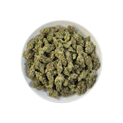 PUFFY Do-Si-Do is an indica-dominant hybrid THCa strain, born from the legendary cross of Girl Scout Cookies (GSC) × Face Off OG. A bold aroma that opens with sharp gassy notes, layered with a sweet candy-like undertone and finished with a distinct chemical edge, creating a pungent yet intriguing profile. Visually striking, with dense medium buds in deep green and purple tones, accented by bright orange pistils and a frosty coat of milky-white trichomes. Consumers often report a calming body high with uplif