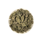 PUFFY Donkey Butter is an indica-dominant hybrid THCa strain formulated through the selective pairing of Kosher Kush and Tangie. The aroma opens with bold diesel fumes layered over rich skunky earthiness, finishing with a deeply pungent intensity. Visually, dense forest green buds with purple hues and fiery orange pistils are coated in sticky trichomes. Consumers often report an uplifting wave of euphoria accompanied by a mild cerebral boost that promotes an elevated mood, followed by deep body relaxation a