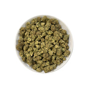 PUFFY Double Shot is a balanced hybrid THCa strain, born from the potent cross between London Pound Mintz and Jealousy. The aroma carries a bold mix of sweet apricot and tropical papaya layered with sharp, chemical undertones. Visually, the buds display deep green tones with hints of purple, bright orange hairs, and a frosty trichome coating. Consumers often report experiencing an uplifting head high that eases into deep physical relaxation and restful sleep.
