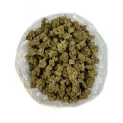 PUFFY Platinum OG is a potent, indica-dominant hybrid THCa strain, thought to be a cross of Master Kush, OG Kush, and a mysterious third cultivar possibly Purps. Renowned for its rich terpene profile, this strain delivers a pungent, earthy aroma laced with pine, wood, and a touch of citrus. Its flavor echoes the scent, offering a bold, earthy taste with subtle citrus notes that linger on the palate. This strain stuns with lime green, dense buds, vibrant orange pistils, and a frosty platinum sheen thanks to 