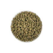 PUFFY Glitter Bomb is an indica-dominant hybrid THCa strain born from the flavorful cross of Grape Gas #10 and OGKB Blueberry Headband. The aroma is a captivating blend of floral notes, rich gassy undertones, and a burst of tropical sweetness. Visually, the buds are dense and deep forest green with striking purple hues, bright orange pistils, and a heavy coating of sparkling white trichomes. Consumers report a bright rush of cerebral uplift that gently settles into a soothing, full-body calm, leaving them g