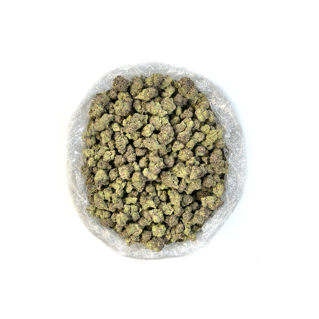 PUFFY GMO THCa, also known as "Garlic Cookies," is a potent indica-dominant strain resulting from the cross between Chemdawg and Girl Scout Cookies. This strain is recognized for its unique, pungent aroma that blends earthy garlic and diesel with subtle spicy undertones. Known for its powerful, long-lasting effects, users claim that GMO delivers a deeply relaxing body high accompanied by a euphoric, mellow headspace, making it a favorite for stress and pain relief.