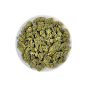 PUFFY GG4, also known as Gorilla Glue #4 is a potent hybrid THCa strain created from a cross between Chem’s Sister, Sour Dubb, and Chocolate Diesel. This strain boasts a bold and pungent aroma, a powerful fusion of gas and sharp menthol, delivering a refreshing scent with a distinct icy edge. The flavor profile is equally rich, offering a harmonious blend of earthy tones, subtle sweetness, and delicate hints of chocolate and coffee. Visually, the buds are dense and chunky, showcasing a vibrant green color a