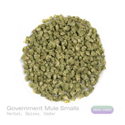 PUFFY Government Mule (smalls) is an indica-dominant hybrid THCa strain, born from the legendary pairing of G13 and Deep Chunk. The aroma is a rich blend of herbal notes, warm spices, and subtle hints of cedar, creating a soothing and earthy fragrance. Visually, dense green buds with hints of purple are threaded with fiery orange pistils and coated in a sparkling layer of sticky trichomes. Consumers often report a wave of happy, euphoric, and focused mental clarity accompanied by strong calming and deeply r