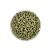 PUFFY Lemon Candy is a sativa-dominant hybrid THCa strain, crafted from the legendary lineage of American indica with NYC Diesel. The aroma is a vibrant blend of zesty lemon with grounding earthy undertones, creating a refreshing and invigorating scent. Visually striking, these dense, frosty buds glisten with trichomes, displaying deep greens with hints of lime and purple, accented by vibrant orange pistils. Consumers often report an initial wave of uplifting euphoria that elevates the spirit and energizes 