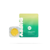 Puffy Papaya Cake is an indica-dominant strain that opens with lush tropical papaya sweetness, layered over a soft vanilla-cake creaminess, and lifted by a hint of bright lemon for a clean, refreshing finish. It delivers an uplifting euphoria with a gentle cerebral buzz that enhances mood before easing into a soothing full-body calm, perfect for relaxation and unwinding.