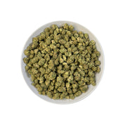 PUFFY Mule Fuel (smalls) is a hybrid THCa strain, crafted from a genetic cross of Lurch and GMO Cookies. The aroma is bold and pungent, with sharp peppery notes, a robust garlicky undertone, and the unmistakable fuel-like scent of diesel. Visually, the buds are dense and compact, showcasing a vibrant olive-green color and a sparkling layer of trichomes. Consumers often report a deeply relaxing experience, characterized by waves of euphoria, soothing calm, a heavy, calming body melt, and a blissful sense of 