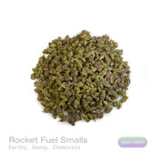 PUFFY Rocket Fuel (smalls) is an indica-dominant THCa strain, bred from a powerhouse cross of Jet Fuel OG and Face Off OG BX1. The aroma profile is distinctly earthy and gassy, with strong chemical undertones that amplify its pungency and depth. Visually, the buds are dense and compact, with a rich forest green base accented by subtle purple hues, vibrant orange pistils, and a thick layer of sparkling white crystalline trichomes. Consumers frequently describe experiencing a euphoric boost, uplifting energy,