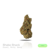 PUFFY Shake Shack is a balanced hybrid THCa strain, born from the flavorful cross of Ice Cream Cake × OG Fruit Smoothie. The aroma combines sharp diesel notes with a cool, minty freshness and a strong gassy undertone. Visually, the buds are dense and chunky, showing forest-green tones with frosty trichomes and subtle orange-amber pistils for contrast. Consumers often describe a soothing full-body relaxation paired with a calm, clear mind, while others note uplifting effects that boost mood, spark euphoria, 