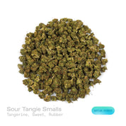 PUFFY Sour Tangie (smalls) is a sativa-dominant hybrid THCa strain, hailing from the legendary genetics of East Coast Sour Diesel and Tangie. The aroma opens with bright, zesty tangerine notes, layered with a sweet undertone and a subtle hint of rubbery earthiness, creating a uniquely vibrant and intriguing scent. Visually, the dense buds display rich forest-green tones with hints of purple, accented by vibrant orange pistils and enveloped in a frosty layer of trichomes. Consumers often report a cerebral, u