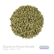PUFFY Supreme Runtz (smalls) is an indica-dominant hybrid THCa strain, crafted from the powerhouse fusion of (Gucci × Blue Dream × Gorilla Glue) and Forbidden Runtz. The aroma is a rich blend of sweet candy notes layered with pungent gas and a crisp hint of pine. Visually, dense dark green buds with purple hues and fiery orange pistils are coated in sticky trichomes. Consumers often report euphoric, uplifting effects that ease into soothing physical relaxation, promoting a happy, creative, and sociable mood