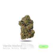 PUFFY Vanilla Waferz is a balanced hybrid THCa strain, created from the fusion of Wedding Cake and Sundae Driver. The aroma offers a warm blend of sweet vanilla and rich butter, rounded out by a soft, doughy scent reminiscent of fresh baked goods. Visually, the buds are dense with vibrant green hues, accented by bright orange pistils and a sparkling layer of white crystalline trichomes. Consumers often report a gradual onset that begins with uplifting euphoria and mental calm, followed by soothing body rela