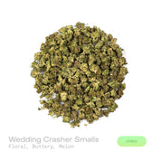 PUFFY Wedding Crasher (smalls) is a balanced hybrid THCa strain, born from the flavorful union of Wedding Cake × Purple Punch. The aroma opens with delicate floral notes layered over a rich, buttery sweetness, rounded out by a refreshing hint of ripe melon that adds a smooth and inviting finish. Visually, the buds are tightly formed, displaying green and purple hues highlighted by bright orange pistils and a thick coating of sparkling trichomes that create a frosty finish. Consumers often report feeling eup