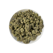PUFFY White Walker is a balanced hybrid THCa strain, born from the potent cross between White Widow and Skywalker. The aroma carries a bold mix of herbal freshness, deep earthy tones, and a sharp gassy edge. Visually striking, dense mint-green buds shimmer with frosty trichomes and bright orange hairs. Consumers often report feeling uplifted, euphoric, and happy, with bursts of energy and sparks of creativity. 

