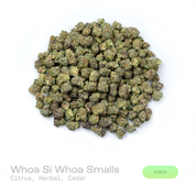 PUFFY Whoa Si Whoa (smalls) is a balanced hybrid THCa strain emerging from the distinguished pairing of  Do-Si-Dos and The White. The aroma opens with bright citrus notes layered over earthy herbal undertones and a subtle cedar finish. Visually, dense olive green buds with purple hues and fiery orange pistils are coated in sticky trichomes. Consumers often report feeling euphoric, relaxed, uplifted, calm, and creatively inspired, offering a balanced experience that promotes positivity, tranquility, and ment