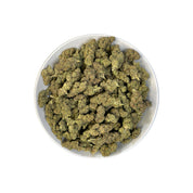 PUFFY Zereal is a well-balanced hybrid THCa strain born from the flavorful cross of Cereal Milk and ZKZ. The aroma is peppery and invigorating, with fresh herbal notes layered over a deep, earthy richness. Visually, it features dense, frosty, cone-shaped buds in rich green, accented by bright orange pistils and occasional hints of blue or purple. Consumers often report fast-acting effects, beginning with an immediate cerebral uplift. The experience is typically marked by waves of euphoria, happiness, and an