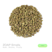 PUFFY Zoap (smalls) is a balanced hybrid THCa strain born from the exotic blend of Pink Guava and Rainbow Sherbet. The aroma opens with a bold kush-forward earthiness, layered with savory onion-like sharpness and finished by a subtle, sweet fruity undertone. Visually, dense earthy green buds with hints of purple are threaded with fiery orange pistils and coated in a sparkling layer of sticky trichomes. Consumers often report a joyful, uplifting euphoria that sparks creativity, followed by gentle body relaxa