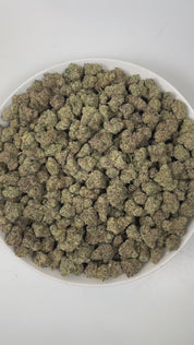 
PUFFY Lemon Cherry Gelato is an indica-dominant  hybrid THCa strain, expertly crafted from a potent cross between Sunset Sherbet and Girl Scout Cookies. The aroma is a lively combination of sweet cherry, playful gassy notes, and bright fruity undertones, creating a vibrant and tantalizing scent profile. Visually, buds are dense and frosty, featuring deep green and purple hues with bright orange pistils and a thick coating of sparkling trichomes. Consumers often report an initial wave of uplifted, happy eup