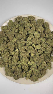 PUFFY Cherry Tart is a balanced hybrid THCa strain expertly curated from the flavorful pairing of Cherry Pie and Very Cherry. The aroma is bright and tangy, blending tart sour notes with juicy cherries and a zesty finish. Visually, dense forest green buds with purple hues and fiery orange pistils are coated in sticky trichomes. Consumers often report an uplifting wave of euphoria that sparks creativity, sharpens focus, boosts energy, encourages conversation, and gradually settles into a calm, relaxed state.