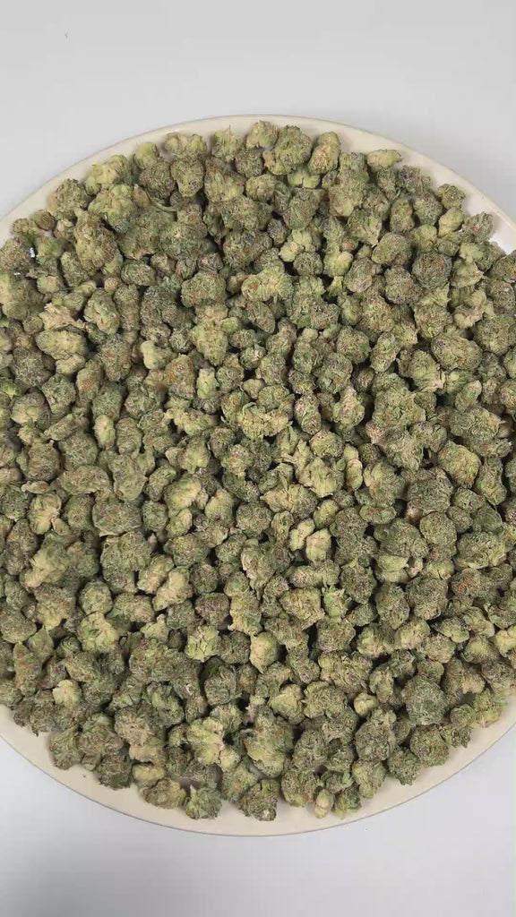 PUFFY Super Boof (smalls) is a balanced hybrid THCa strain created from the exotic blend of Black Cherry Punch and Tropicana Cookies. The aroma bursts with vibrant notes of grapefruit, lime, and oranges, offering a sharp and juicy citrus character. Visually, it showcases dense, chunky buds in vivid olive green, adorned with fiery orange hairs and cloaked in a sparkling frost of trichomes. Consumers often report effects that are uplifting, euphoric, and creatively stimulating, while also providing a sense of