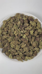 PUFFY Chemlato is a balanced hybrid THCa strain, born from the cross of Gelato #33 and Chemdawg. The aroma is a rich blend of woody undertones, fresh herbal notes, and warm, inviting spices that linger pleasantly on the senses. Visually, the buds are dense, featuring green and purple hues, vibrant orange pistils, and a sparkling layer of trichomes. Consumers often report an initial uplifting and euphoric mental high that sparks creativity, gradually transitioning into a calm and mellow body sensation.