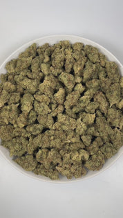 PUFFY Blue Dream is a sativa-dominant hybrid THCa strain born from the legendary cross between Blueberry and Haze. The aroma is a bold and tantalizing blend of gassy undertones, bright tropical fruits, and zesty citrus notes. Visually, dense lush green buds with purple hues and fiery orange pistils are coated in sticky trichomes. Consumers often report a euphoric, uplifting head high that flows into a gentle, motivating body buzz, perfect for clear, creative daytime energy.