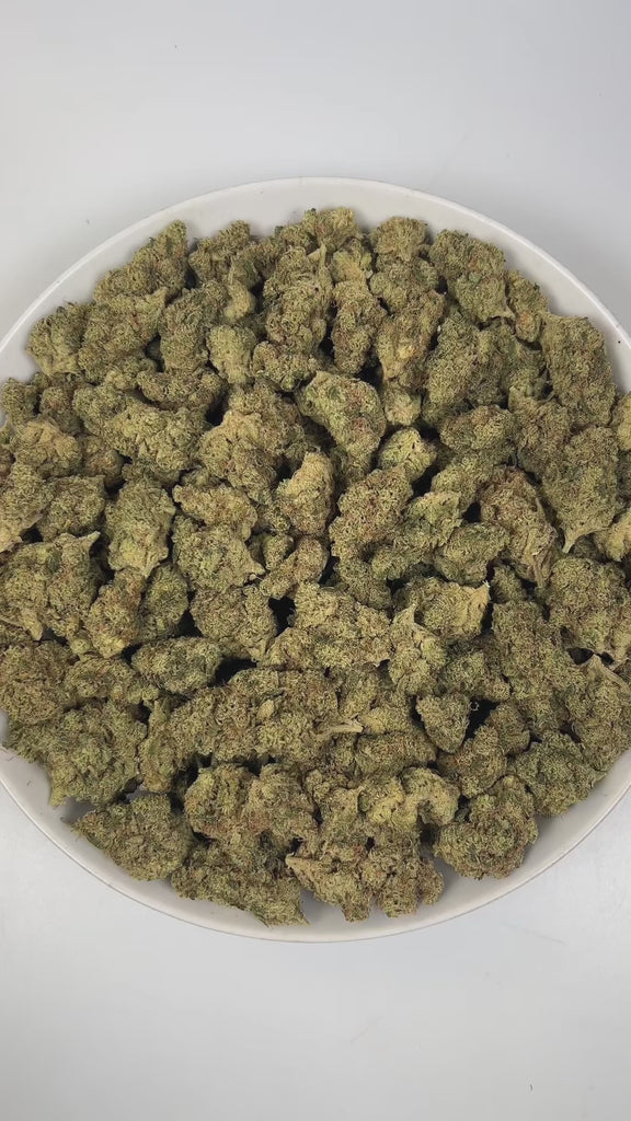 PUFFY Blue Dream is a sativa-dominant hybrid THCa strain born from the legendary cross between Blueberry and Haze. The aroma is a bold and tantalizing blend of gassy undertones, bright tropical fruits, and zesty citrus notes. Visually, dense lush green buds with purple hues and fiery orange pistils are coated in sticky trichomes. Consumers often report a euphoric, uplifting head high that flows into a gentle, motivating body buzz, perfect for clear, creative daytime energy.