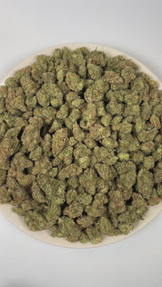 PUFFY Galactic Jack is a sativa-dominant hybrid THCa strain born from the legendary lineage of Jack Herer and Space Queen. The aroma is a sharp blend of chemical undertones, zesty citrus notes, and a hint of ammonia. Visually, the buds feature vibrant green hues accented by fiery orange pistils and a dense coating of frosty trichomes, giving them a sparkling, crystal-like appearance. Consumers often report an energetic, focused high accompanied by a strong sense of euphoria and heightened creativity, often 