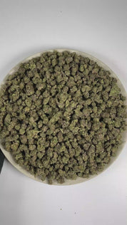 PUFFY Blueberry Gumbo (smalls) is a balanced hybrid THCa strain expertly cultivated from the notable genetics of Blueberry and OG Kush. The aroma is an exquisite medley of luscious candy, succulent berries, and refined fruity notes. Visually, dense forest green buds with purple hues and fiery orange pistils are coated in sticky trichomes. Consumers often report an euphoric and uplifting experience accompanied by a lively, energetic sense of momentum. 