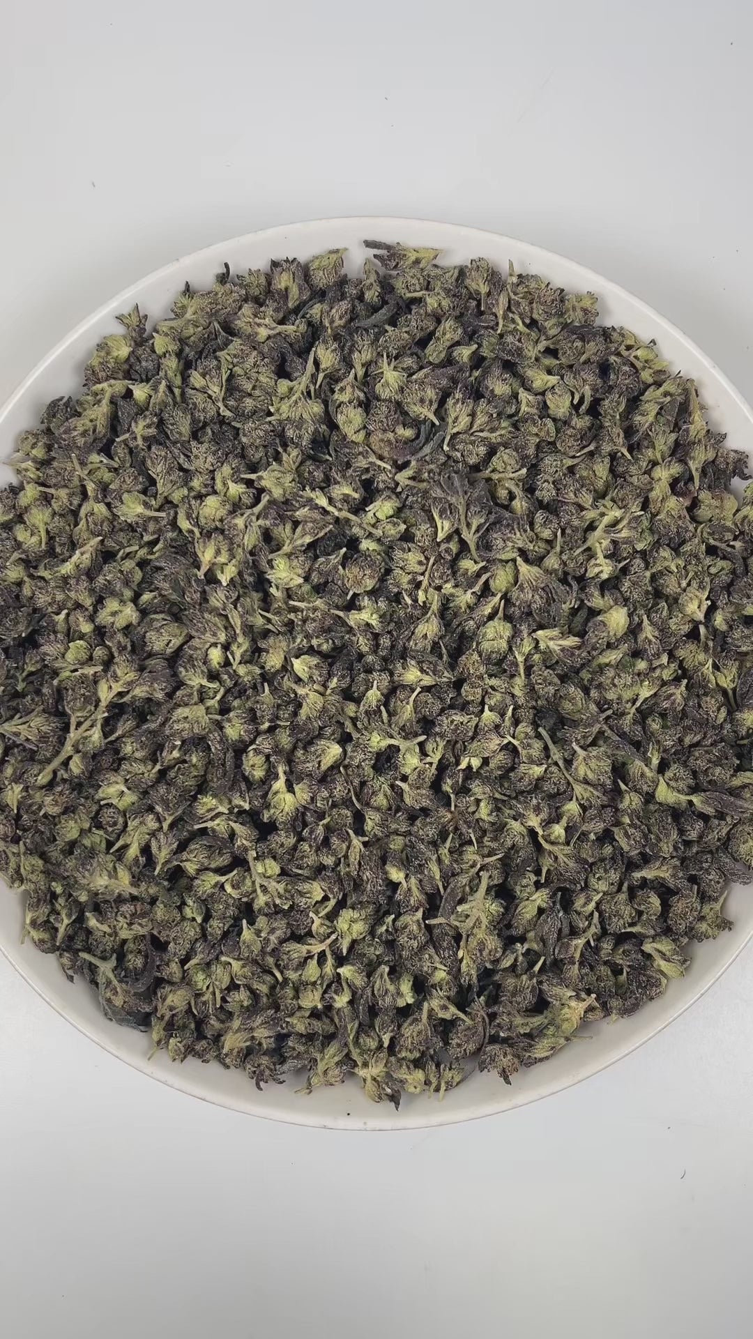 PUFFY The Sauce (smalls) is a sativa-dominant hybrid THCa strain expertly crafted from the renowned pairing of Green Ribbon BX and Gorilla Glue 4 (GG4). The aroma opens with rich notes of grape and fruity sweetness, underscored by a subtle hint of savory onion. Visually, dense olive green buds with purple hues and fiery orange pistils are coated in sticky trichomes. Consumers often report a euphoric high that boosts mood and creativity, promotes energy, focus, and sociability, and finishes with a light, soo