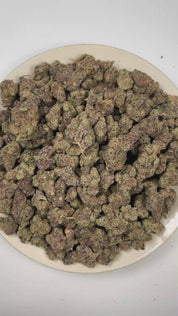 PUFFY Zero Gravity is a balanced hybrid THCa strain born from the legendary pairing of Holy Grail Kush and Smurfzilla. The aroma is bursting with bright grapefruit and juicy orange notes, delivering a refreshing and distinctly fruity experience. Visually, dense deep forest green buds with purple hues and fiery orange pistils are coated in sticky trichomes. Consumers often report feeling euphoric, creative, and energetic while maintaining a calm and balanced state of mind. 