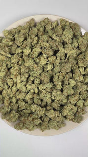 PUFFY Cloud Candy (smalls) is a balanced hybrid THCa strain whose exact genetic lineage has not been publicly confirmed, leaving its true parentage unknown. The aroma bursts with vibrant fruity sweetness and juicy tropical notes, creating a bright, exotic fragrance that finishes with a bold, mouthwatering sour twist. Visually, dense forest green buds with purple hues and fiery orange pistils are coated in sticky trichomes. Consumers often report an uplifting wave of euphoria that inspires creativity while g