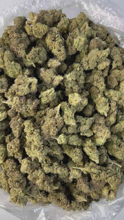 PUFFY Zereal is a well-balanced hybrid THCa strain born from the flavorful cross of Cereal Milk and ZKZ. The aroma is peppery and invigorating, with fresh herbal notes layered over a deep, earthy richness. Visually, it features dense, frosty, cone-shaped buds in rich green, accented by bright orange pistils and occasional hints of blue or purple. Consumers often report fast-acting effects, beginning with an immediate cerebral uplift. The experience is typically marked by waves of euphoria, happiness, and an