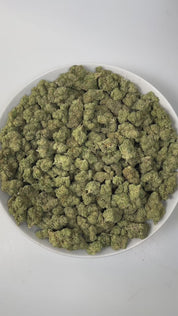 PUFFY Turbo Lemon Cake is a sativa-dominant hybrid THCa strain, carefully bred from crosses of Sour Kush, Turbo Diesel, Sour Diesel, and Harlequin. The aroma opens with bold notes of diesel, layered with earthy undertones and a bright hint of lemon, creating a truly captivating sensory experience. Visually, dense forest‑green buds with hints of purple and fiery orange pistils are generously coated in sticky, sparkling trichomes. Consumers often report an energetic, uplifting, and happy cerebral buzz that sp
