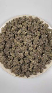 
PUFFY Chrome Dome is a sativa-leaning hybrid THCa strain crafted from the dynamic fusion of Lemonheadz and Eye Candy. The aroma is vibrant grapefruit, unfolding into zesty lime, and finishing with crisp, resinous pine. Visually, dense forest green buds with purple hues and fiery orange pistils are coated in sticky trichomes. Consumers often report an initial euphoric, creative, uplifted, and focused mental state followed by a calming body relaxation. 
