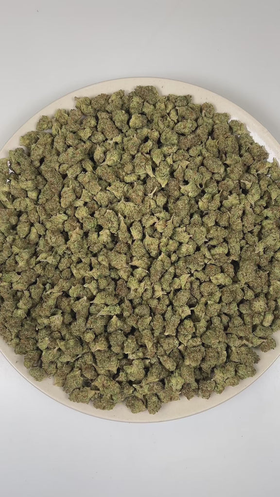 PUFFY Apricot (smalls) is a balanced hybrid THCa strain bred from the flavorful union of Purple Punch and Orange Apricot. The aroma is a rich blend of classic kush notes layered with pungent gassy undertones and a subtle floral sweetness. Visually, dense deep green buds with purple hues and fiery orange pistils are coated in sticky trichomes. Consumers often report an energetic, social onset with euphoric uplift and lighthearted laughter, gradually settling into a relaxed body feel with a lightly creative, 