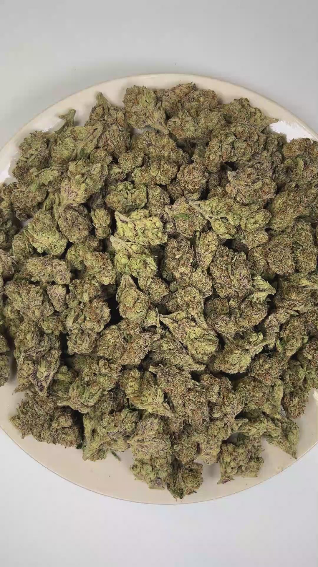 PUFFY Lip Smacker is an indica-dominant hybrid THCa strain crafted from the flavorful convergence of  Sherbert and Strawberries & Cream. The aroma opens with bright citrus notes layered over sharp chemical undertones and a bold fuel-like finish. Visually, dense forest green buds with purple hues and fiery orange pistils are coated in sticky trichomes. Consumers often report a deeply euphoric, relaxing, and calming experience that promotes a peaceful state of mind while helping them unwind after a long day. 