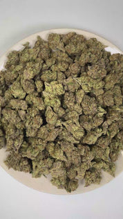 PUFFY Lip Smacker is an indica-dominant hybrid THCa strain crafted from the flavorful convergence of  Sherbert and Strawberries & Cream. The aroma opens with bright citrus notes layered over sharp chemical undertones and a bold fuel-like finish. Visually, dense forest green buds with purple hues and fiery orange pistils are coated in sticky trichomes. Consumers often report a deeply euphoric, relaxing, and calming experience that promotes a peaceful state of mind while helping them unwind after a long day. 