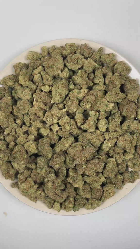 PUFFY Dutch Punch is an indica-dominant THCa strain emerging from the renowned pairing of Purple Punch and Dutch Treat. The aroma hits with sharp diesel fuel, layered with harsh chemical undertones, and finishes with a deep, lingering skunky funk. Visually, dense forest green buds with purple hues and fiery orange pistils are coated in sticky trichomes. Consumers often report an euphoric, mood-lifting head high paired with deep physical relaxation that settles the body into a calm, restful state. 