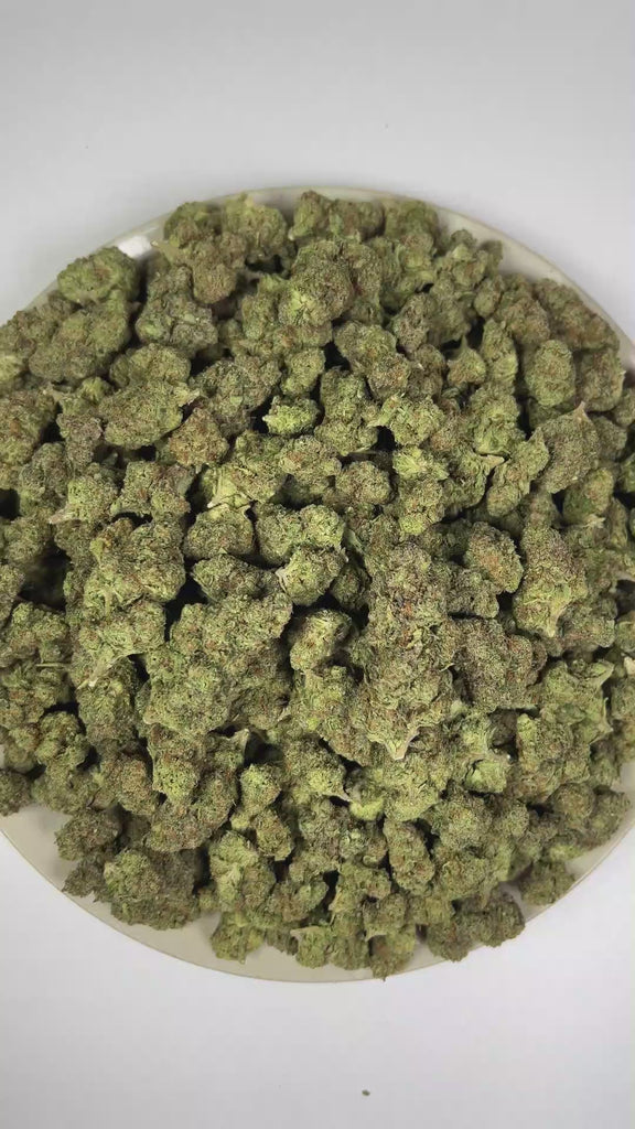 PUFFY Permanent Marker is an indica-dominant hybrid THCa strain, born from the complex cross of Biscotti, Jealousy, and Sherbet BX. The aroma features rich tobacco notes blended with pungent fuel undertones and delicate floral accents. Visually, dense forest green buds with purple hues and fiery orange pistils are coated in sticky trichomes. Consumers often report a blissful euphoria that uplifts the mood, sparks creativity, creates gentle tingling sensations, and envelops the body in deep, relaxing calm.  