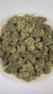 PUFFY Candy Jelly is a balanced hybrid THCa strain featuring an unreleased genetic blend, widely believed to originate from a combination of sweet, candy-inspired, and fruit-forward modern varieties. The aroma opens with a vibrant blend of sweet candy and juicy tropical fruit, layered with a bold gassy finish. Visually, dense lush green buds with purple hues and fiery orange pistils are coated in sticky trichomes. Consumers often report feeling euphoric, cheerful, and inspired, followed by a calm, relaxed s