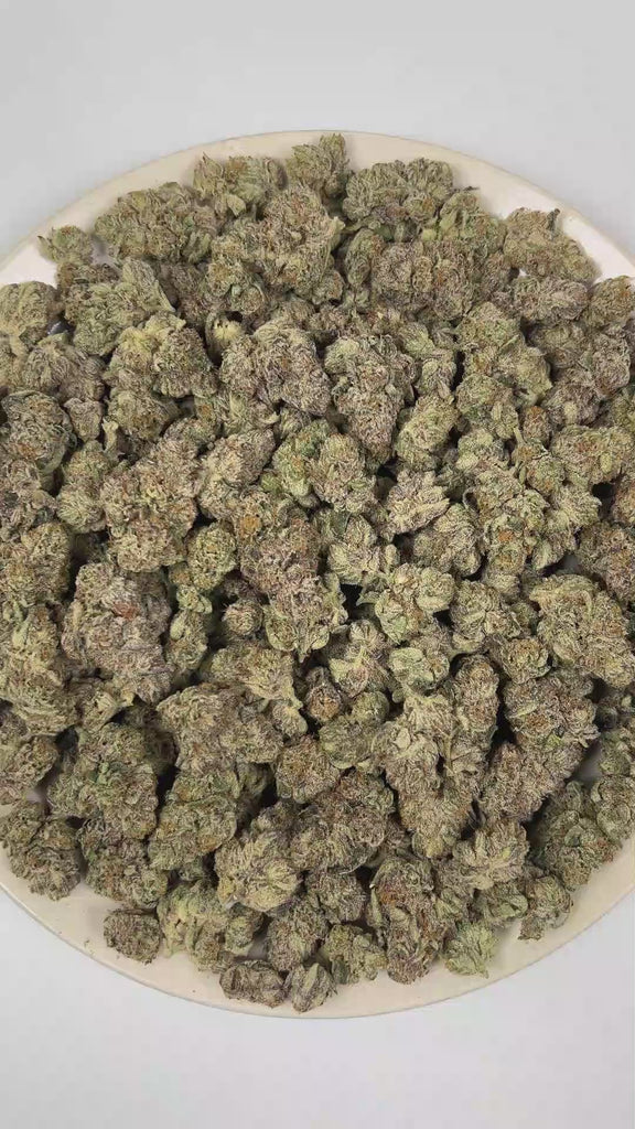 PUFFY Tropical Runtz is a sativa-dominant hybrid THCa strain developed by combining the renowned genetics of Runtz and Tropic Truffle. The aroma blends sweet fragrant notes with juicy berries and a pronounced funky undertone. Visually, dense forest green buds with purple hues and fiery orange pistils are coated in sticky trichomes. Consumers often report an uplifting wave of euphoria that sparks creativity, sharpens focus, encourages sociability, and gradually settles into a calm, deeply relaxed state. 