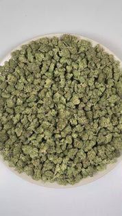 PUFFY Cream Pie (smalls) is an indica-dominant hybrid THCa strain bred from the exceptional pairing of Wedding Cake and Triangle Kush. The aroma is a delightful blend of sweet cookies, subtle herbal notes, and a juicy hint of ripe peach. Visually, dense spring green buds with purple hues and fiery orange pistils are coated in sticky trichomes. Consumers often report a euphoric and uplifting cerebral buzz followed by smooth body relaxation, creating a calming, stress-relieving experience that can ease tensio