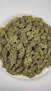 PUFFY Head Haze is a sativa-dominant hybrid THCa strain resulting from the expertly blended union of Brain OG and Tom Hill’s Haze. The aroma blends bright citrus notes with a pungent, gassy character, finishing with a delicate floral touch. Visually, dense forest green buds with purple hues and fiery orange pistils are coated in sticky trichomes. Consumers often report a euphoric, uplifting, and energetic experience that sparks creativity while delivering a soothing sense of body relaxation. 