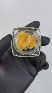 PUFFY THCa Guavanade Badder: is a premium sativa-dominant hybrid concentrate crafted from fresh-frozen flower and expertly cured into a smooth, scoopable badder. It delivers an invigorating aroma of tropical citrus with sweet guava undertones, offering a bright and flavorful experience with every dab.
