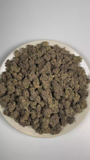 PUFFY Race Fuel OG is an indica-dominant hybrid THCa strain born from the iconic pairing of High Octane OG and Face Off OG. The aroma is a blend of warm spices and earthy woody notes, finishing with a refreshing herbal character. Visually, dense forest green buds with purple hues and fiery orange pistils are coated in sticky trichomes. Consumers often report euphoric, uplifting, and mood-enhancing effects, accompanied by a relaxed and calming experience. 