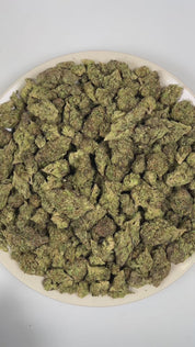 PUFFY Grand Daddy Purple is an indica-dominant hybrid THCa strain bred from a legendary three-way genetic cross of Mendo Purps, Skunk, and Afghan landrace lineage. Aroma is richly expressive, delivering deep dank, sharp skunky, and heavy gassy notes. Visually, dense forest green buds with purple hues and fiery orange pistils are coated in sticky trichomes. Consumers often report a euphoric mood lift paired with deep, full-body relaxation that gently eases tension while elevating overall mood. 