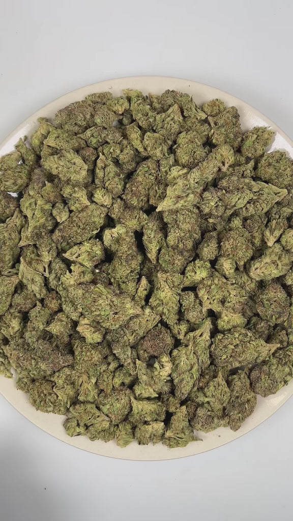 PUFFY Grand Daddy Purple is an indica-dominant hybrid THCa strain bred from a legendary three-way genetic cross of Mendo Purps, Skunk, and Afghan landrace lineage. Aroma is richly expressive, delivering deep dank, sharp skunky, and heavy gassy notes. Visually, dense forest green buds with purple hues and fiery orange pistils are coated in sticky trichomes. Consumers often report a euphoric mood lift paired with deep, full-body relaxation that gently eases tension while elevating overall mood. 