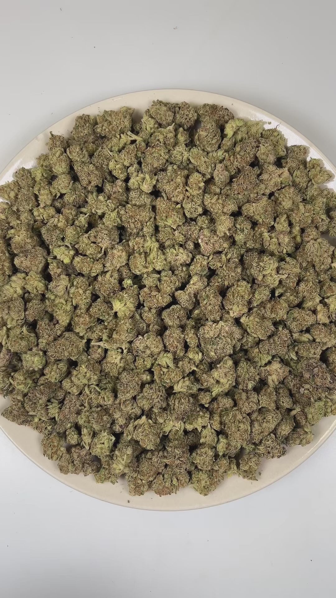 PUFFY Zoap (smalls) is a balanced hybrid THCa strain born from the exotic blend of Pink Guava and Rainbow Sherbet. The aroma opens with a bold kush-forward earthiness, layered with savory onion-like sharpness and finished by a subtle, sweet fruity undertone. Visually, dense earthy green buds with hints of purple are threaded with fiery orange pistils and coated in a sparkling layer of sticky trichomes. Consumers often report a joyful, uplifting euphoria that sparks creativity, followed by gentle body relaxa