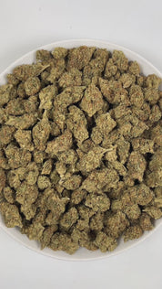 PUFFY White Fire OG is a balanced hybrid THCa strain, crafted from the legendary lineage of Fire OG and The White. The aroma is a refreshing blend of eucalyptus, subtle chemical undertones, and soothing hints of lavender. Visually, dense light-green buds with hints of purple, bright orange pistils, and a thick coating of sparkling trichomes. Consumers often experience an immediate spark of mental clarity and creative energy that gently flows into a calming, tension-relieving body high.